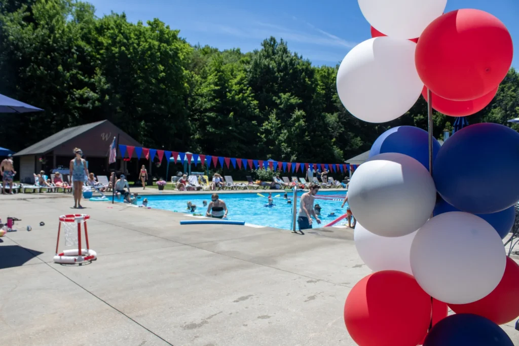 Families enjoying an afternoon around the outdoor pool at The Wembley Club in Chagrin Falls