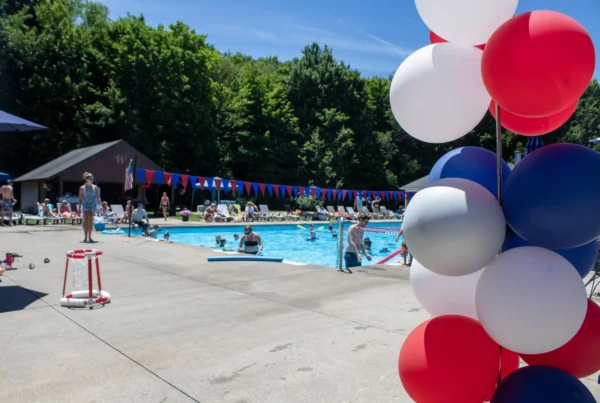 Families enjoying an afternoon around the outdoor pool at The Wembley Club in Chagrin Falls